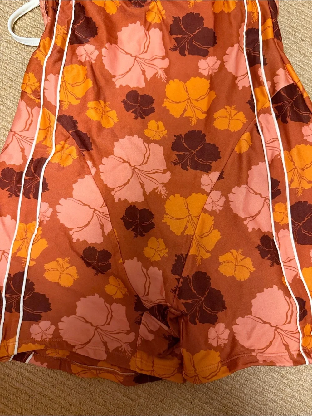 Strait. The Label. One piece hibiscus romper